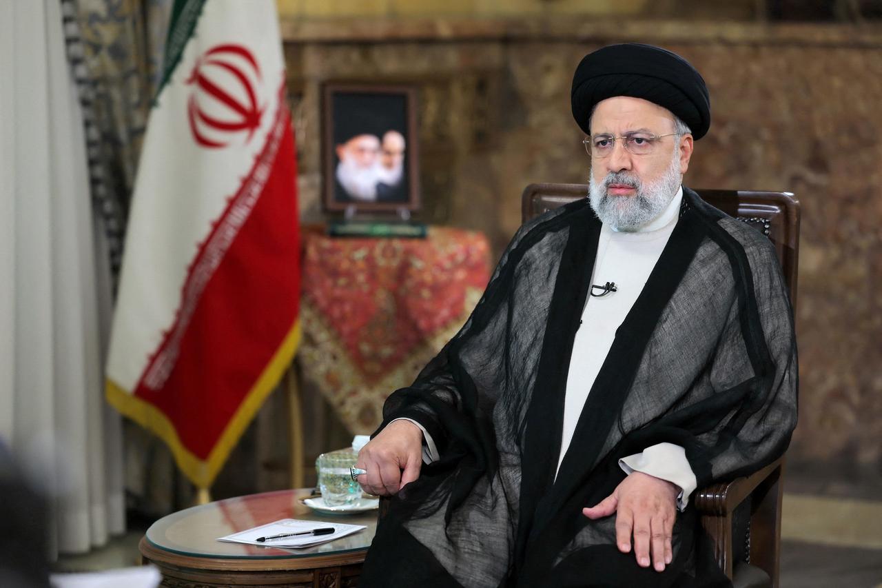 Iranian President Ebrahim Raisi attends a TV interview in Tehran