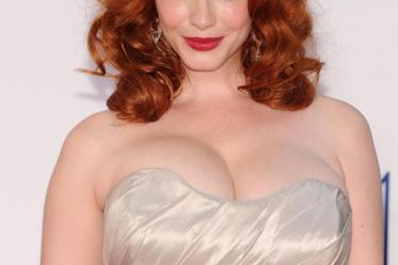'Christina Hendricks arrives for the 64th annual Prime Time Emmy Awards at the Nokia Theatre at LA Live in Los Angeles, California September 23, 2012.  AFP PHOTO / ROBYN BECK'