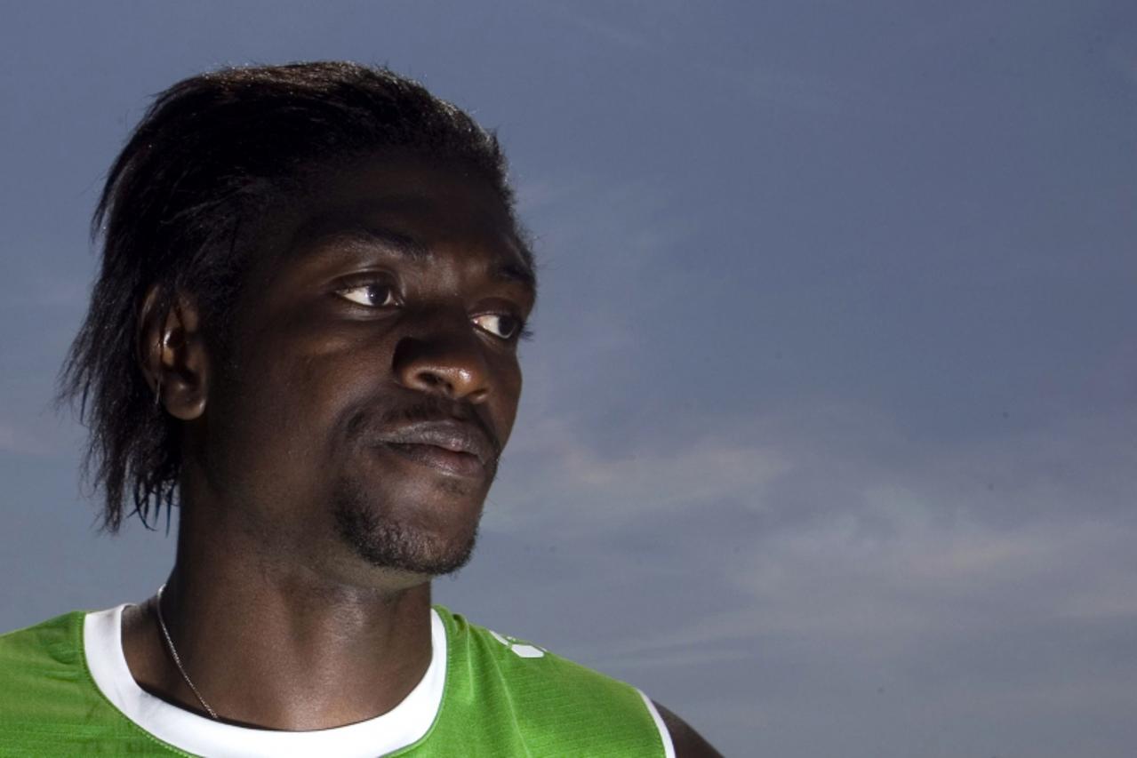 \'Togo\'s Emmanuel Adebayor listens to journalists\' questions after a World Cup soccer training session in Wangen June 15, 2006. REUTERS/Miro Kuzmanovic (GERMANY)\'
