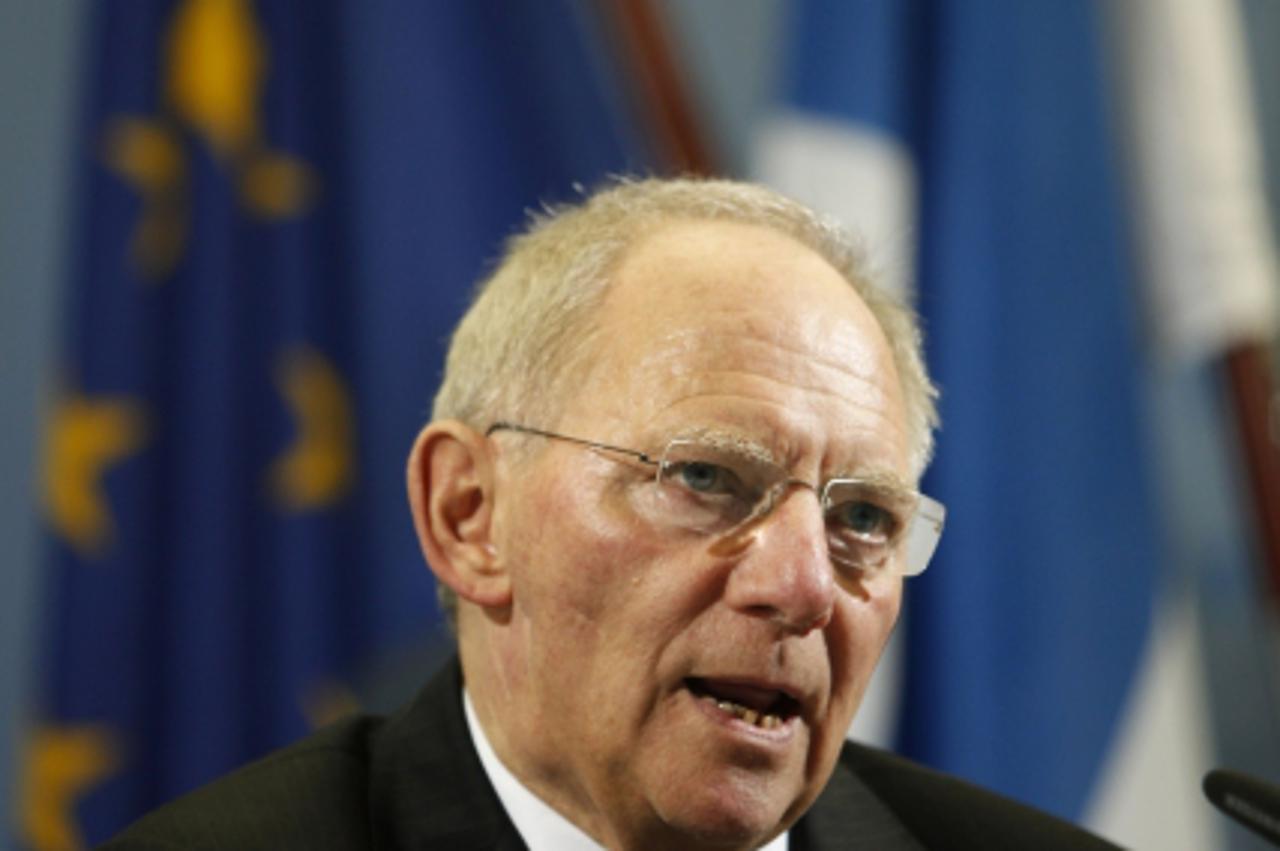 \'German Finance Minister Wolfgang Schaeuble speaks during a press conference at the Finance Ministry in Berlin on November 25, 2011. Schauble had a meeting with Finnish Finance minister Jutta Urpilai