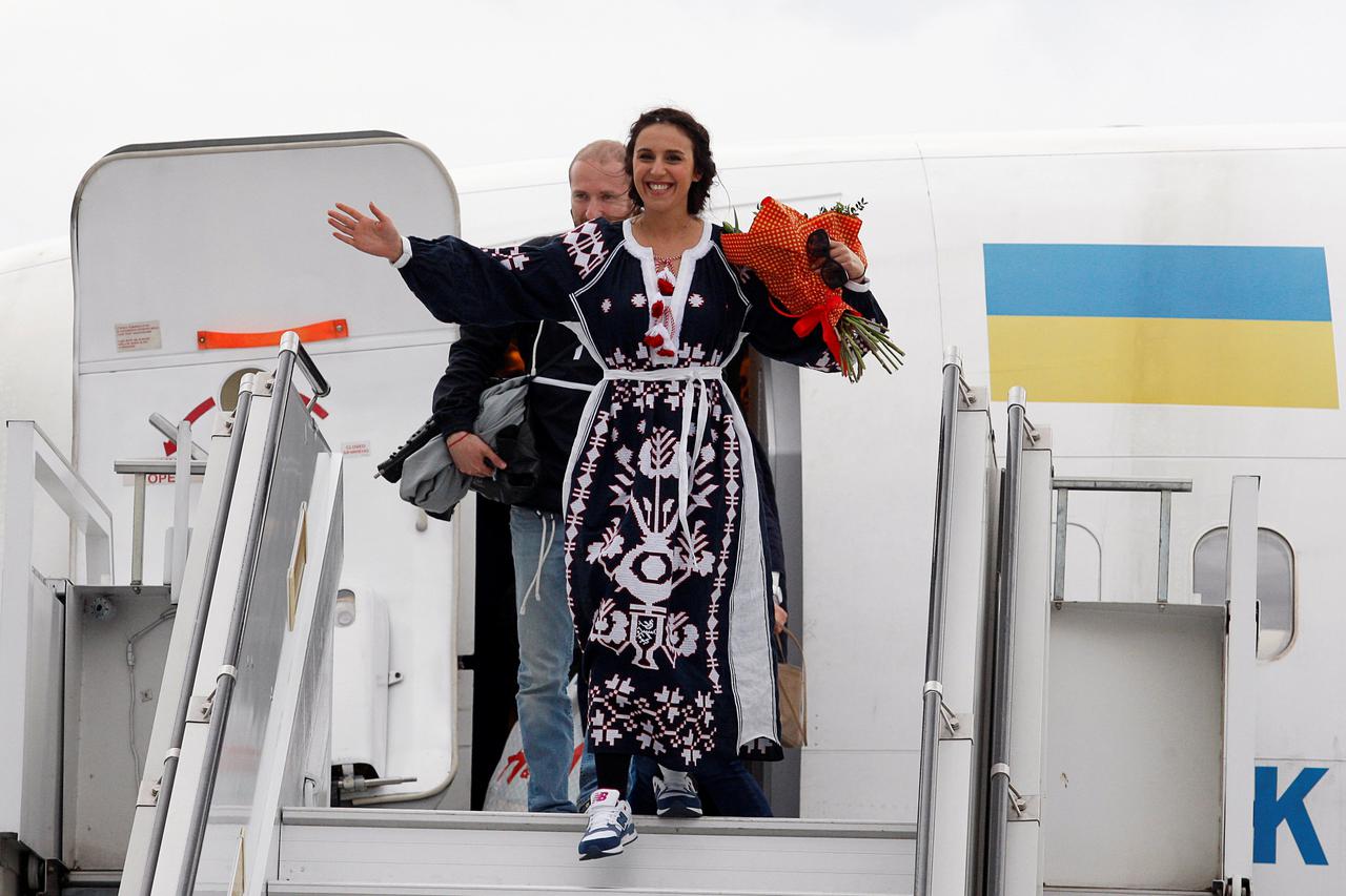 Crimean Tatar singer Susana Jamaladinova, known as Jamala, who won the Eurovision Song Contest, leaves a plane during a welcoming ceremony upon her arrival at Boryspil International Airport outside Kiev, Ukraine, May 15, 2016. REUTERS/Roman Baluk         