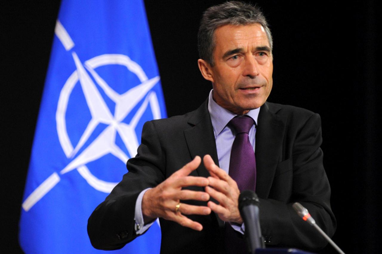 'NATO Secretary General Anders Fogh Rasmussen gives a joint press during the NATO ministers Defence and Foreign Affairs meeting at the NATO Headquarters in Brussels, on April 18, 2012.  AFP PHOTO/JOHN