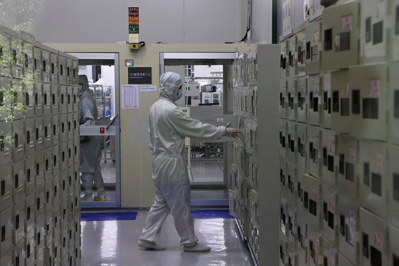 A member of staff approaches a locker at a lab at the Taiwan Semiconductor Research Institute (TSRI) at Hsinchu Science Park in Hsinchu