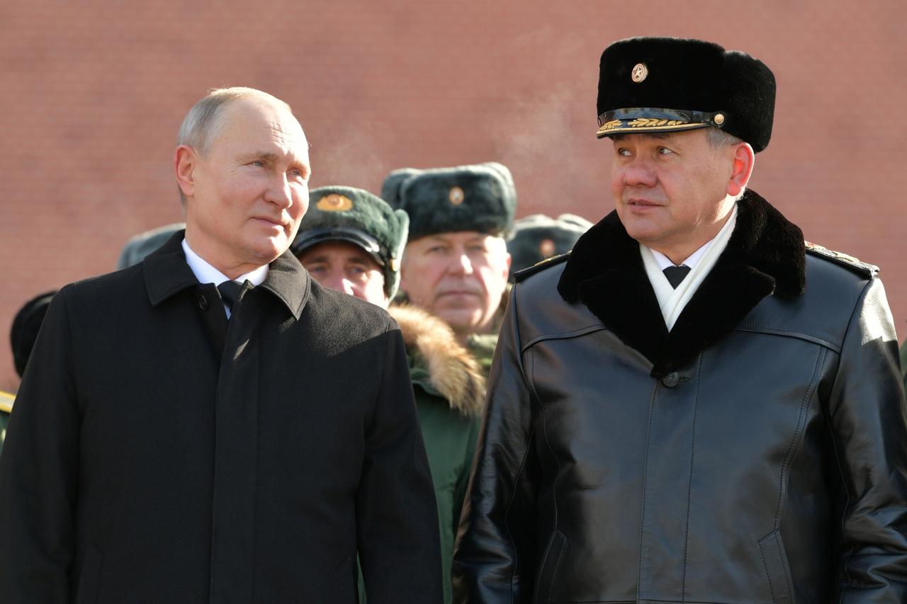 Russia's President Putin and Defence Minister Shoigu attend a wreath-laying ceremony in Moscow