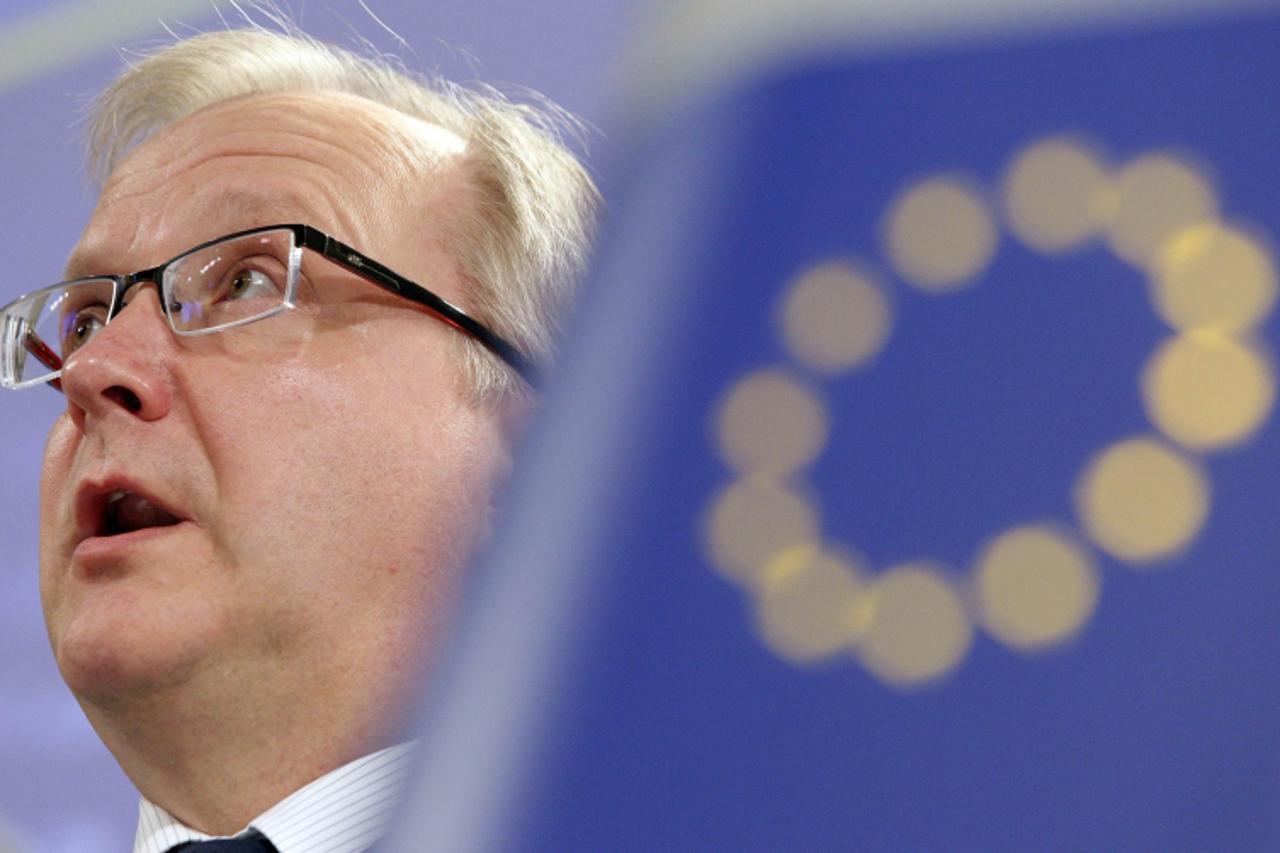 'European Commissioner for Finance Olli Rehn speaks during a news conference with Luxembourg\'s Prime Minister Jean-Claude Juncker (not on picture), who is also Chairman of the Eurogroup, in Brussels 