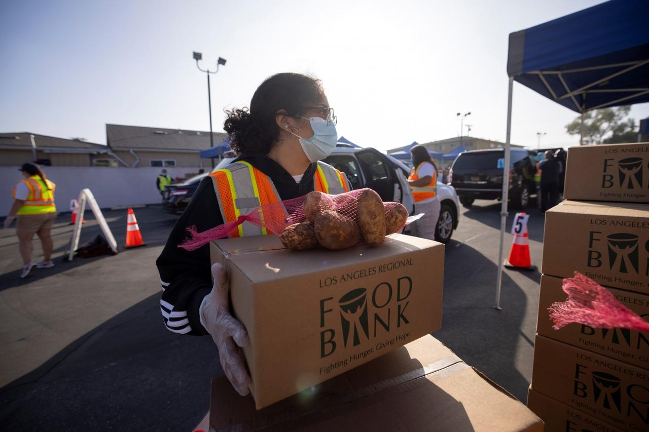 The Los Angeles Regional Food Bank distributes food outside a church during the outbreak of the coronavirus disease (COVID-19) in Los Angeles