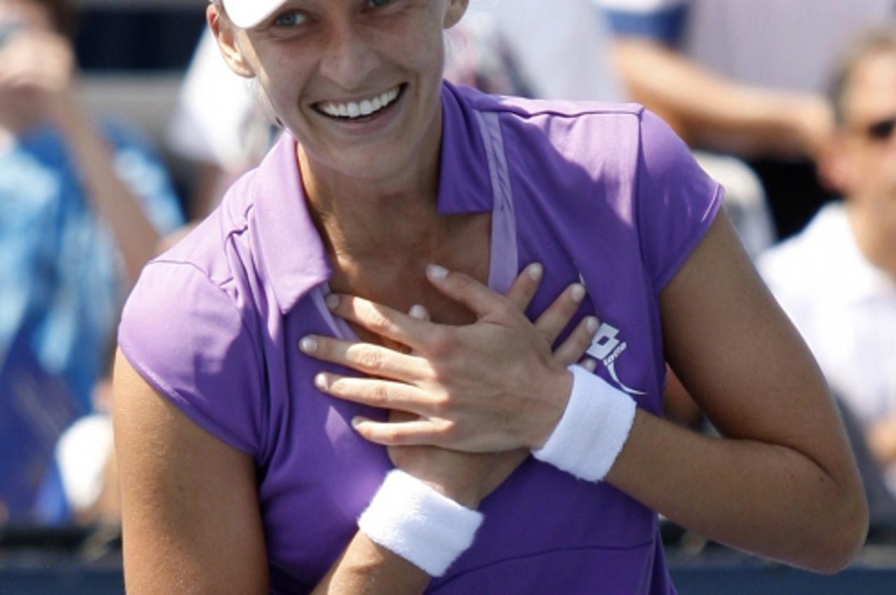 \'Mirjana Lucic of Croatia reacts after her victory against Alicia Molik of Australia during the U.S. Open tennis tournament in New York, August 31, 2010. REUTERS/Eduardo Munoz (UNITED STATES - Tags: 