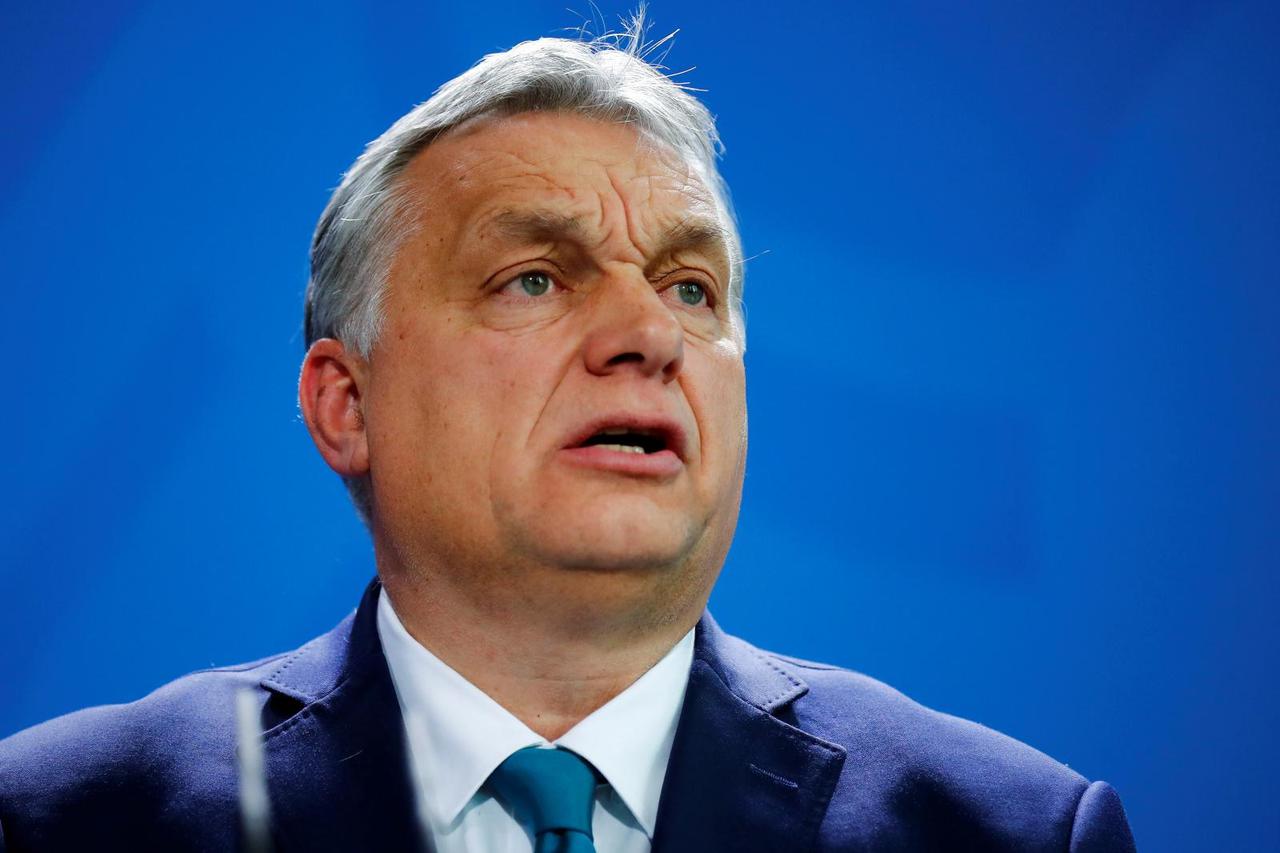 FILE PHOTO: Hungarian Prime Minister Orban speaks to media before talks with German Chancellor Merkel at Chancellery in Berlin