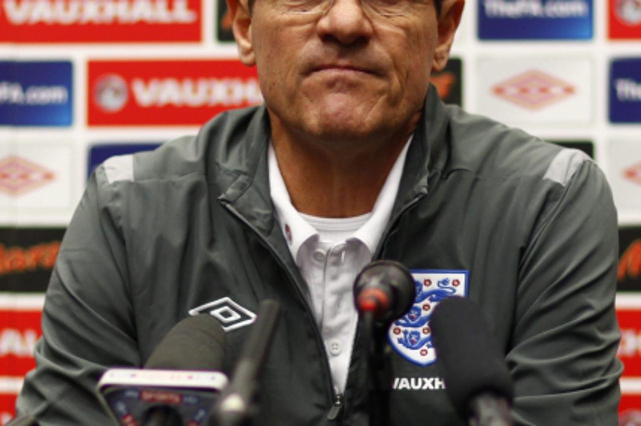 'England manager Fabio Capello attends a media conference at Wembley Stadium in London March 28, 2011. England are due to play Ghana in an international friendly soccer match in London on Tuesday.    