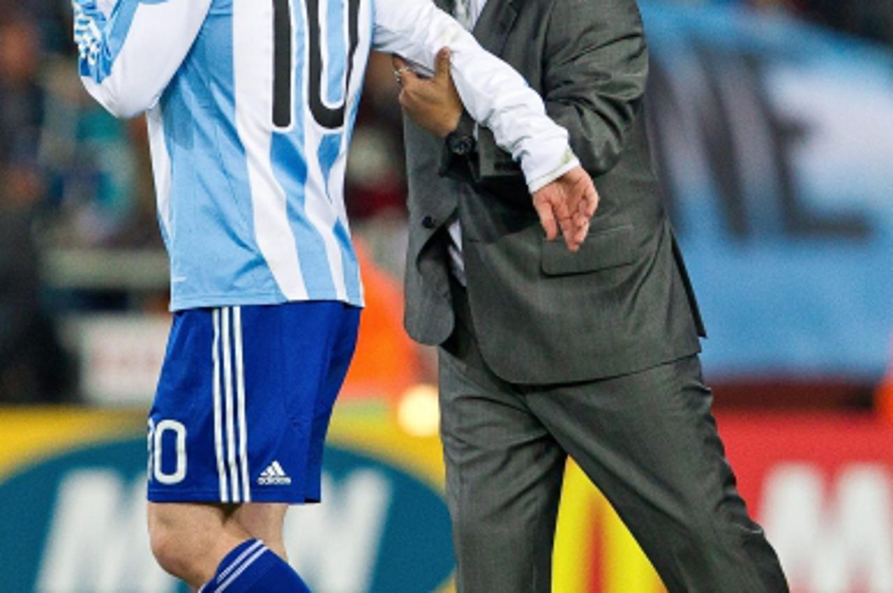 '27.06.2010, Soccer City Stadium, Johannesburg, RSA, FIFA WM 2010, Argentina (ARG) vs Mexico (MEX), im Bild Diego Maradona (L) and Lionel Messi (R) of Argentina celebrate after the 2010 FIFA World Cup