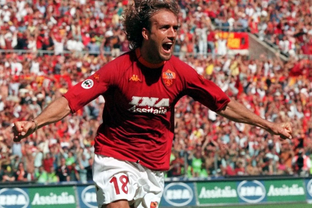 '** FILE ** Roma\'s Gabriel Batistuta celebrates after scoring for his team during the Italian League soccer match between Roma and Parma at Rome\'s Olympic stadium, in this Sunday, June 17, 2001 file