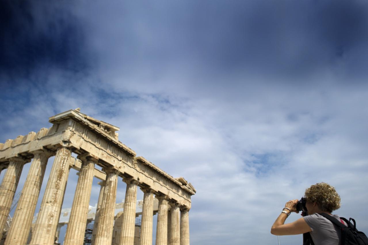 'Tourists visit the Parthenon in the Acropolis in Athens, Greece, 29 June 2011. Photo: Arno Burgi/DPA/PIXSELL'