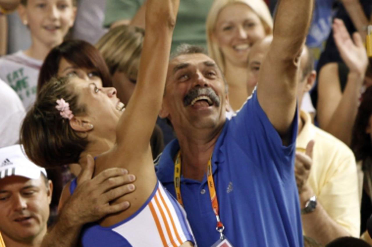 \'Croatia\'s Blanka Vlasic and her father Josko Vlasic gesture as she competes in the women\'s high jump at the IAAF Continental Cup 2010 in Split September 5, 2010.  REUTERS/Matko Biljak (CROATIA - T