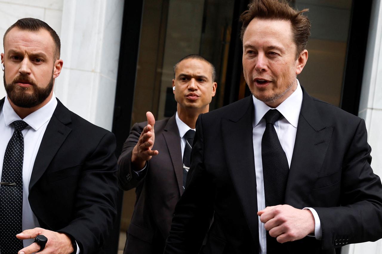 Tesla CEO Musk departs the company’s local office in Washington