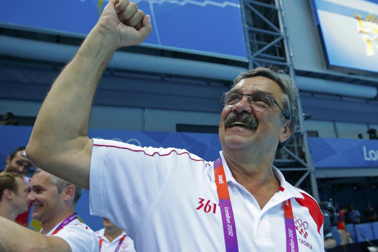 'Croatia head coach Ratko Rudic reacts after his team defeated the U.S. in their Men\'s Quarterfinal water polo match during the London 2012 Olympic Games August 8, 2012.             REUTERS/Laszlo Ba