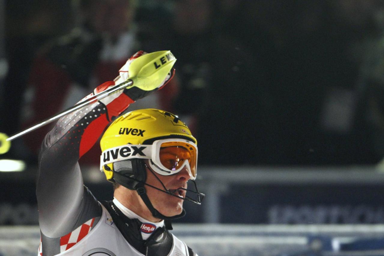 \'Croatia\'s Ivica Kostelic reacts after winning the men\'s Alpine Skiing World Cup parallel slalom in downtown Munich January 2, 2011.  REUTERS/Michaela Rehle (GERMANY - Tags: SPORT SKIING)\'