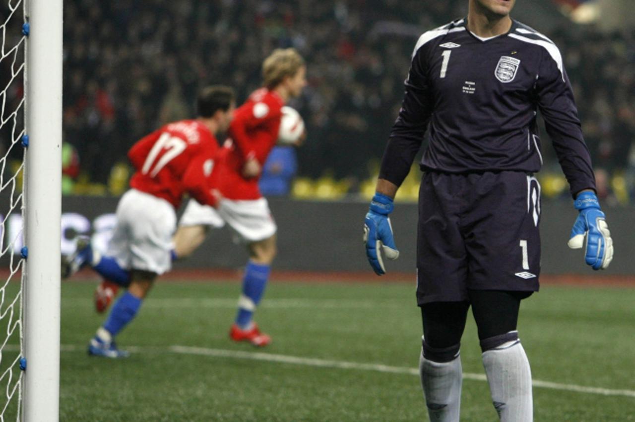 'England\'s Paul Robinson reacts after Russia\'s Roman Pavlyuchenko scored from the penalty spot during their Euro 2008 Group E qualifying soccer match at the Luzhniki stadium in Moscow October 17, 20