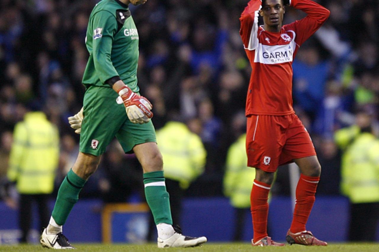 'Soccer - FA Cup - Sixth Round - Everton v Middlesbrough - Goodison Park Dejected Middlesbrough players Marvin Emnes (right) and Brad Jones (left) after the final whistle.'