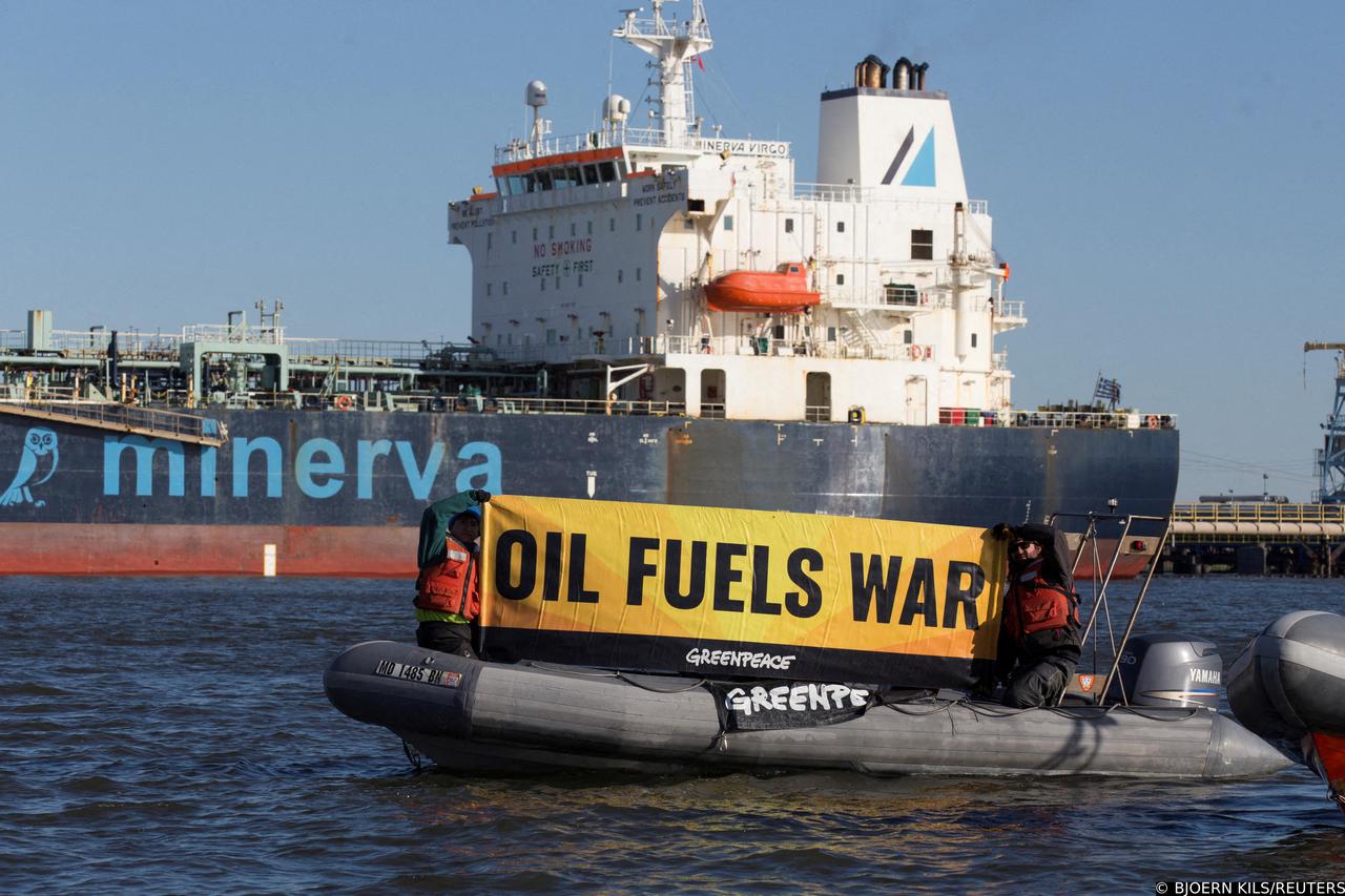 FILE PHOTO: Activists protest near Oil tanker Minerva Virgo docked at the Bayonne New Jersey