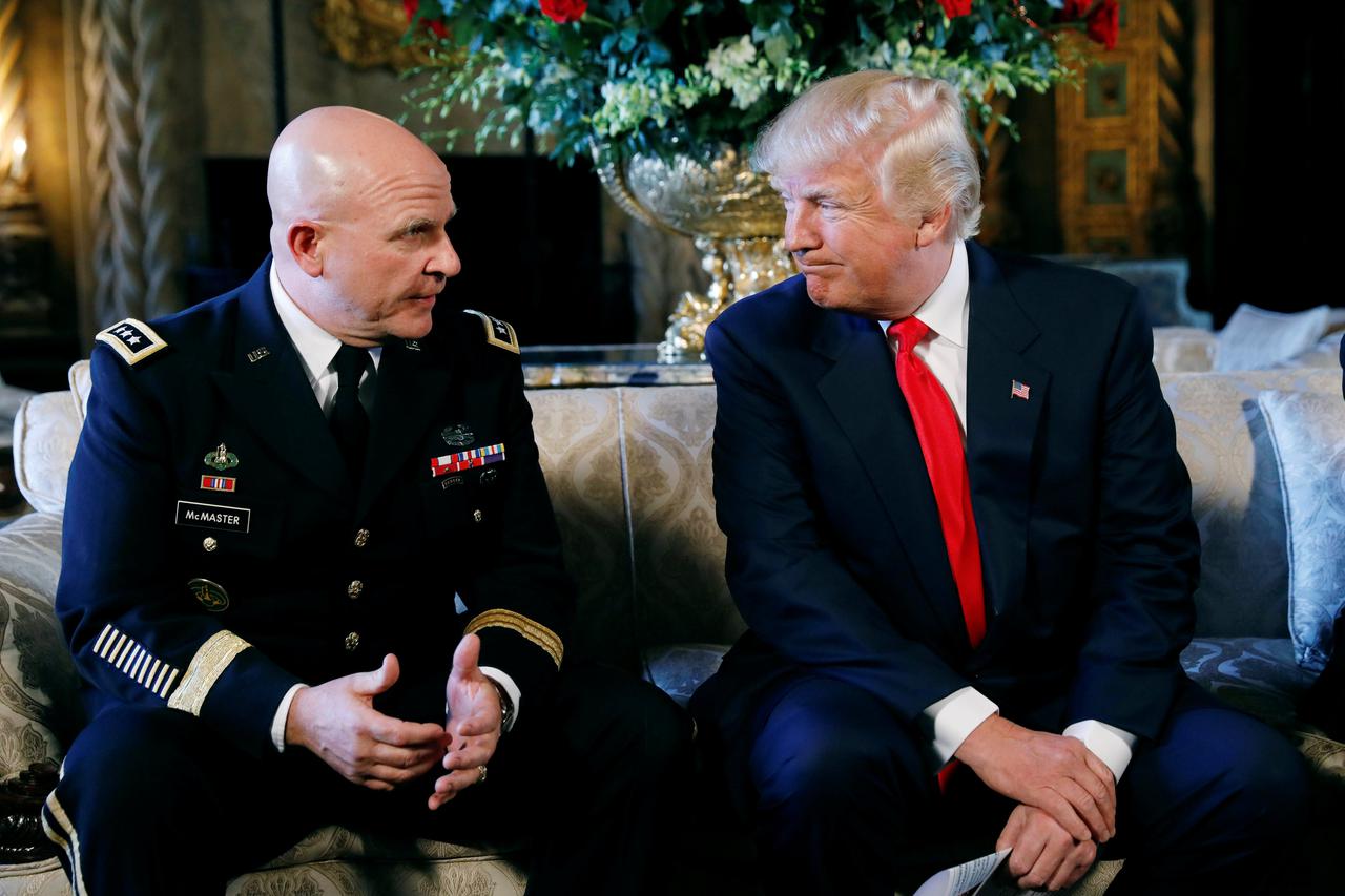 U.S. President Donald Trump looks toward his new National Security Adviser Army Lt. Gen. H.R. McMaster after making the announcement at his Mar-a-Lago estate in Palm Beach, Florida U.S. February 20, 2017.  REUTERS/Kevin Lamarque