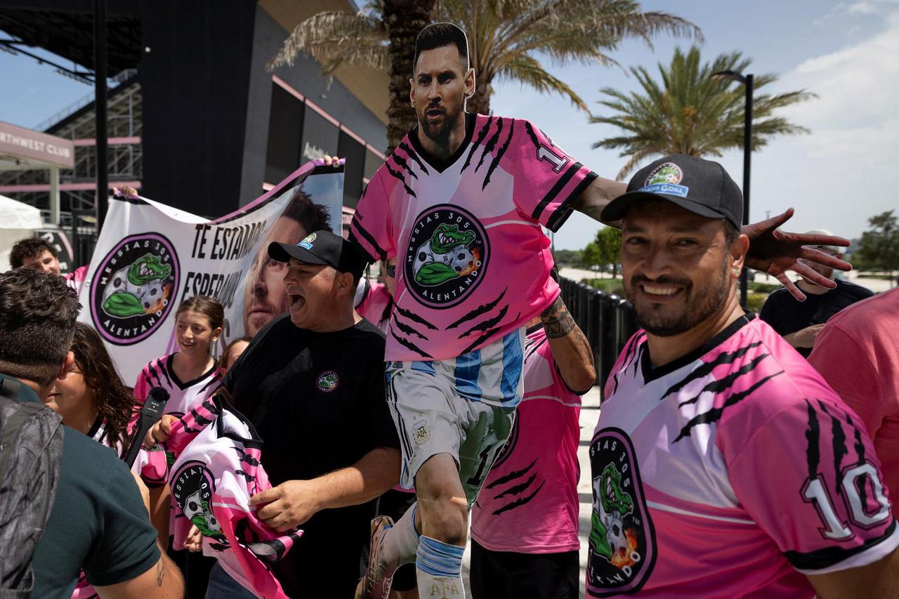 Supporters of Argentinian soccer player Leo Messi gather outside the Inter Miami DRV Pnk Stadium, in Fort Lauderdale