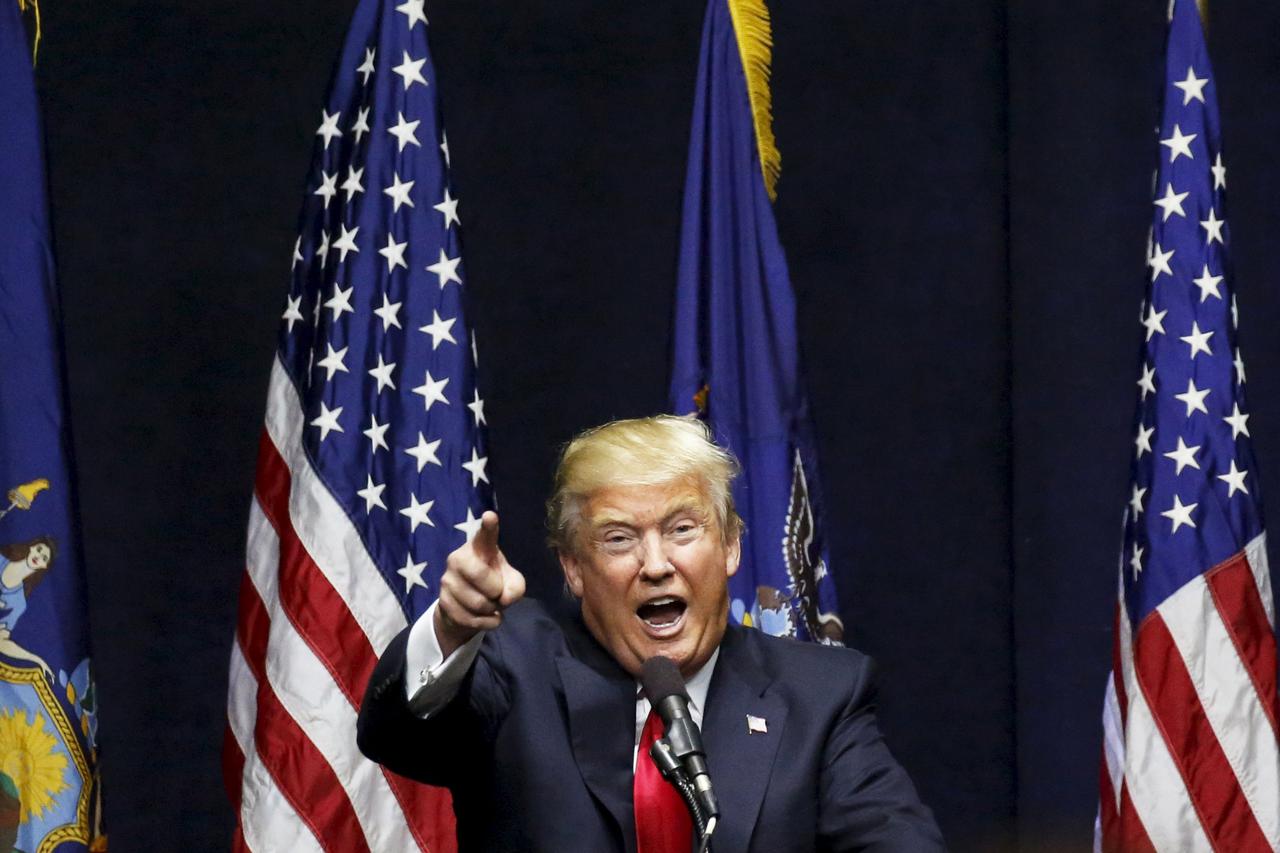 U.S. Republican presidential candidate Donald Trump points during a campaign event at Grumman Studios in Bethpage, New York April 6, 2016.   REUTERS/Shannon Stapleton