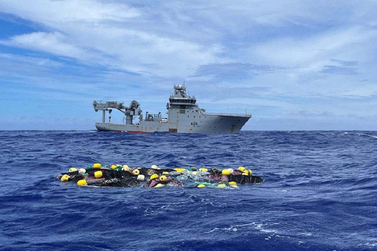 A view shows bags of cocaine in a net floating in the Pacific Ocean