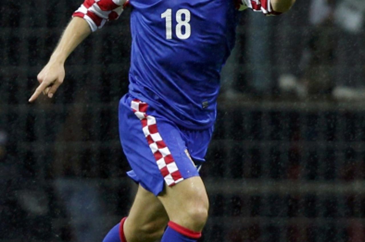'Croatia\'s Ivica Olic celebrates his goal aginst Turkey during the first leg of their Euro 2012 play-off soccer match at Turk Telekom Arena in Istanbul November 11, 2011. REUTERS/Murad Sezer (TURKEY 