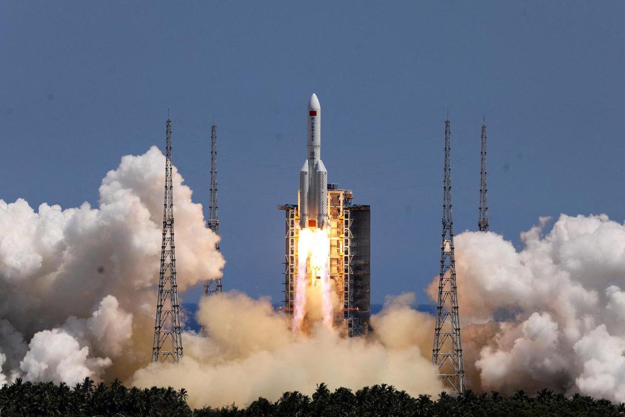 FILE PHOTO: Long March-5B Y3 rocket, carrying Wentian lab module, takes off from Wenchang