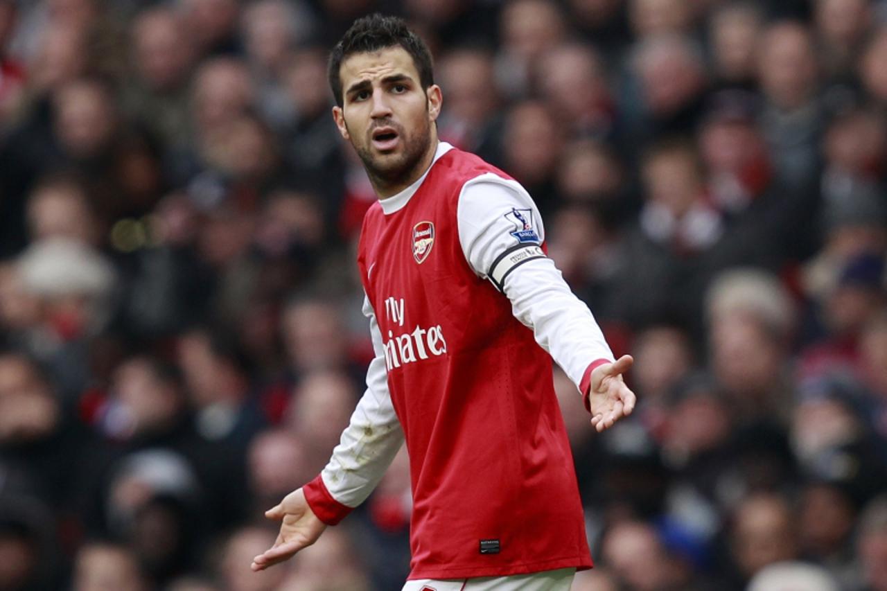 \'Arsenal\'s Cesc Fabregas reacts during their English Premier League soccer match against Tottenham Hotspur at The Emirates Stadium in London November 20, 2010.    REUTERS/Eddie Keogh (BRITAIN - Tags