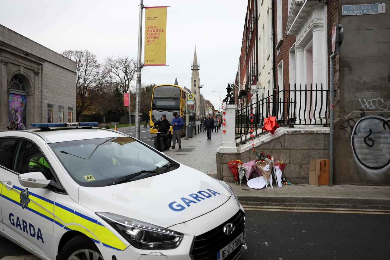 Tributes at the scene of a school stabbing, in Dublin