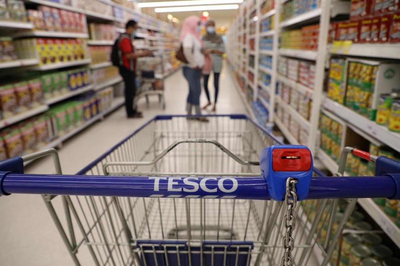 FILE PHOTO: A shopping cart is pictured in a Tesco supermarket, amid the coronavirus disease (COVID-19) outbreak in Petaling Jaya