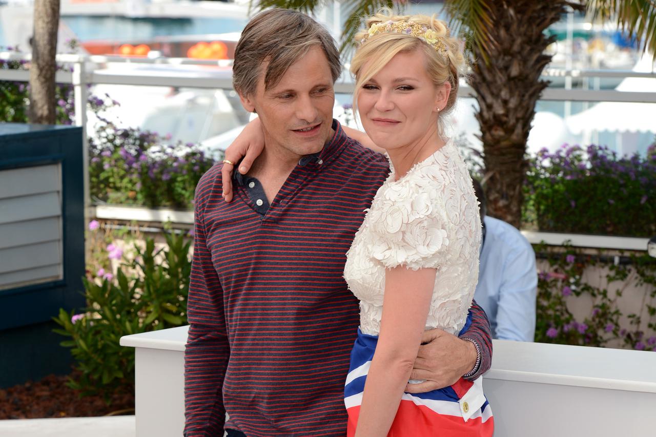 Viggo Mortensen and Kirsten Dunst at the photocall for On The Road at the Palais de Festival. Part of the 65th Cannes Film Festival.      Photo: