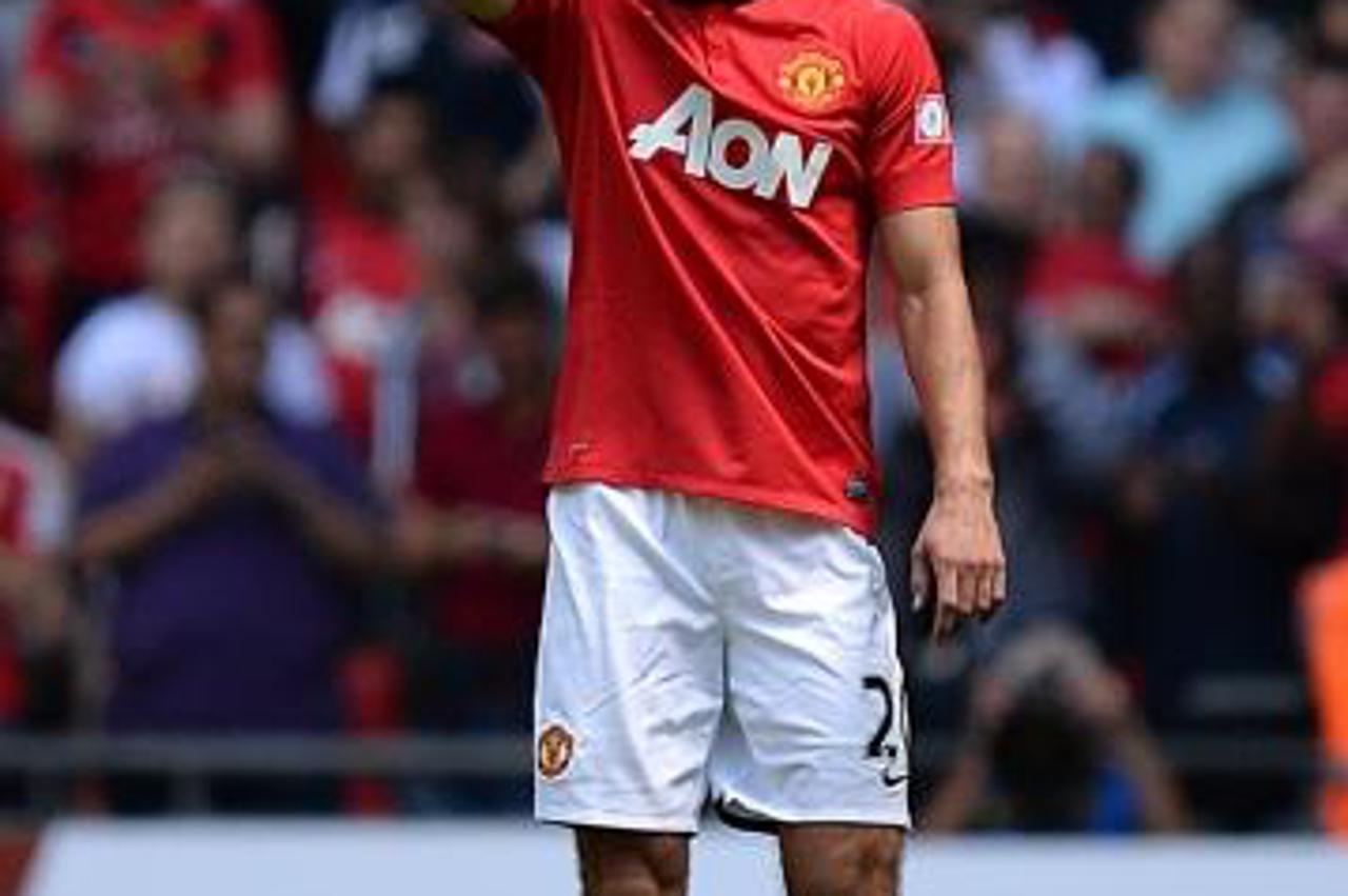 'Manchester United\'s Robin van Persie celebrates scoring the opening goal of the gamePhoto: Press Association/PIXSELL'