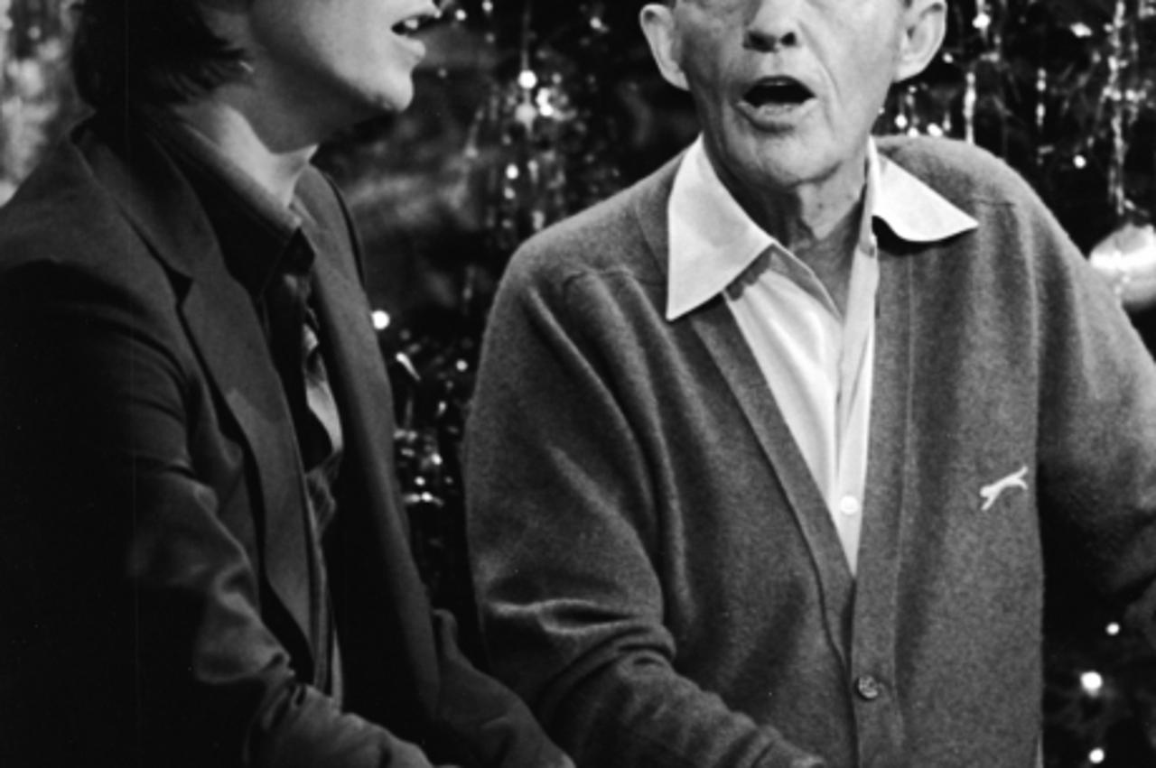 'British rock singer and actor David Bowie performs with American pop singer Bing Crosby for the TV special, \'Bing Crosby\'s Merrie Olde Christmas,\' London, England. (Photo by CBS Photo Archive/Cour