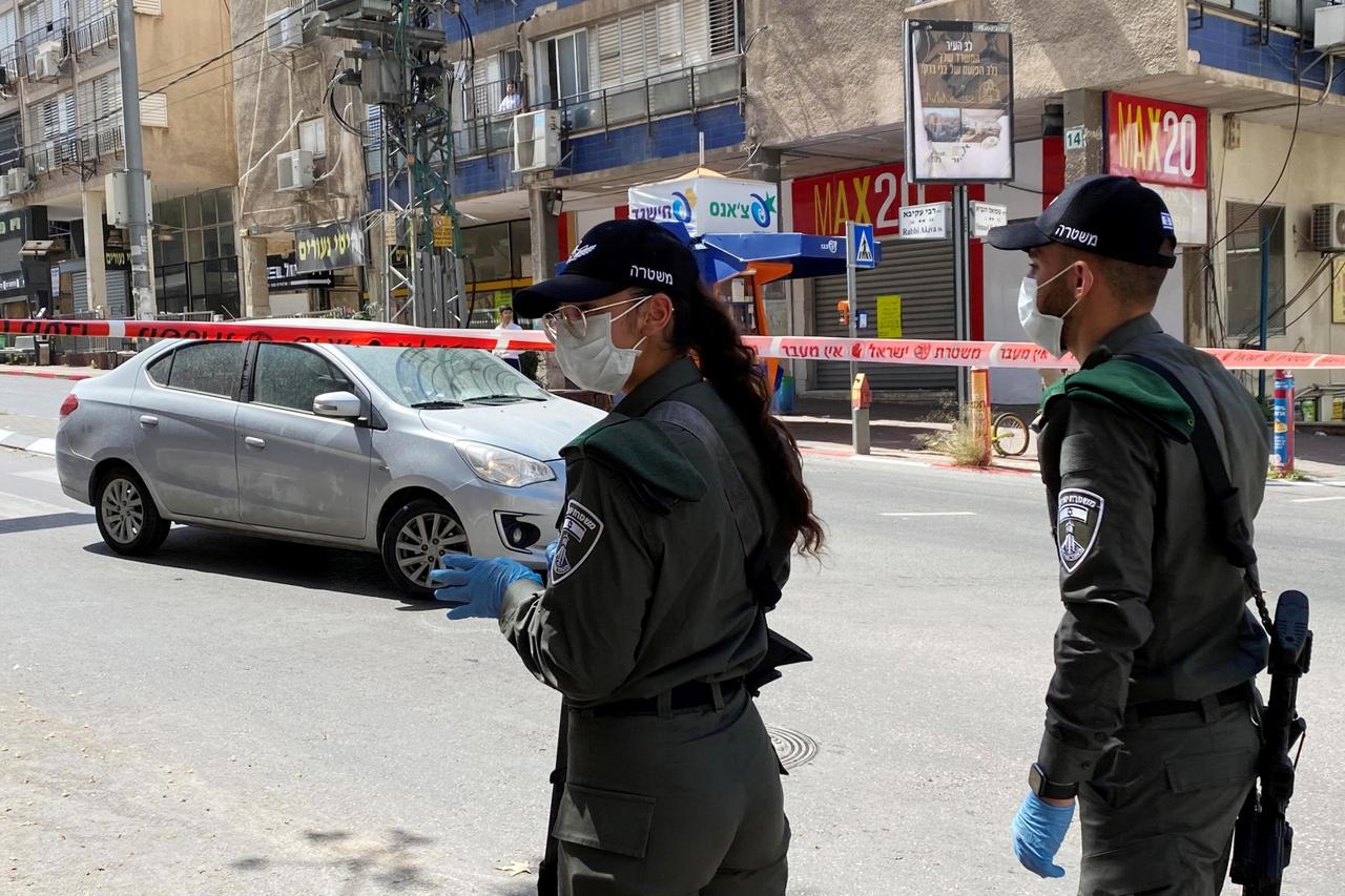 Israeli police stand guard at the entrance to the town of Bnei Brak as they enforce a lockdown of the ultra-Orthodox Jewish town badly affected by coronavirus disease (COVID-19), Bnei Brak