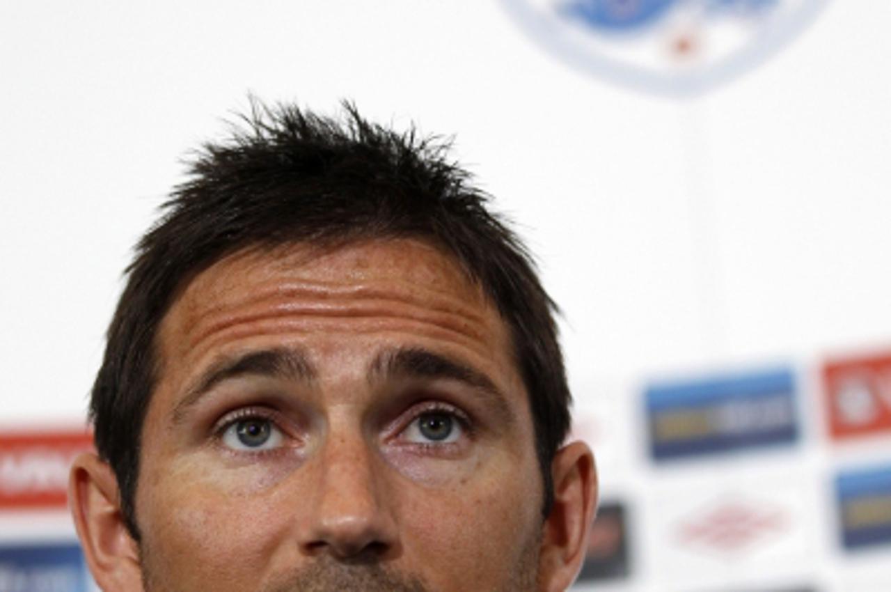 'England\'s soccer player Frank Lampard attends a news conference at the Grove Hotel near Watford May 29, 2012. England will play Belgium in an international friendly match at Wembley on Saturday. REU