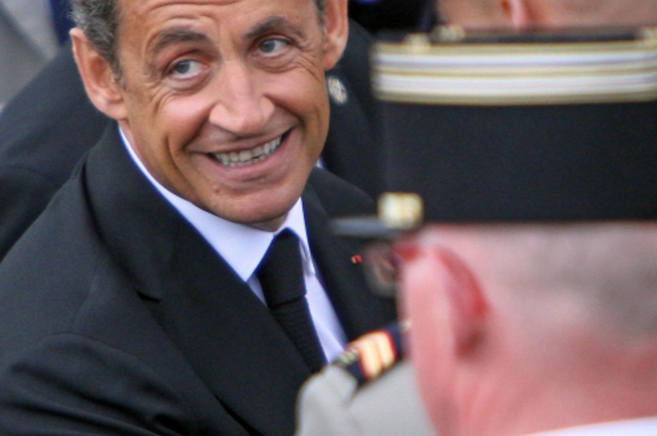 \'WORLD RIGHTS NO USA, FRANCE, AUSTRALIA.   French President Nicolas Sarkozy greets military officers and invited guests during the Bastille Day annual military parade at the Place de la Concorde in P