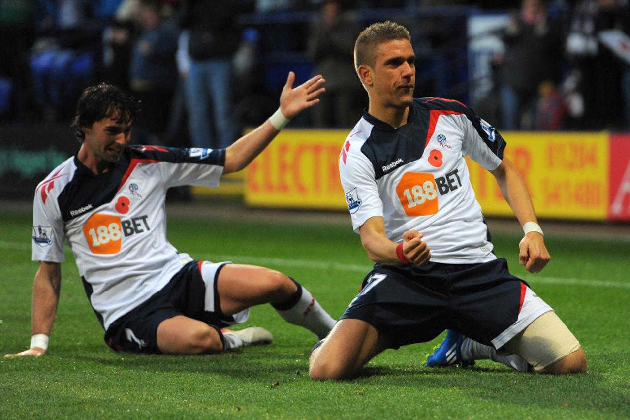 'Bolton Wanderers\' Croatian forward Ivan Klasnic (R) celebrates after scoring the third goal during the English Premier League football match between Bolton and Stoke City at the Reebok stadium, Bolt