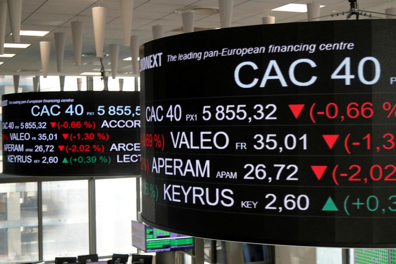 FILE PHOTO: Stock market operators work at the Euronext headquarters at La Defense business and financial district in Courbevoie near Paris