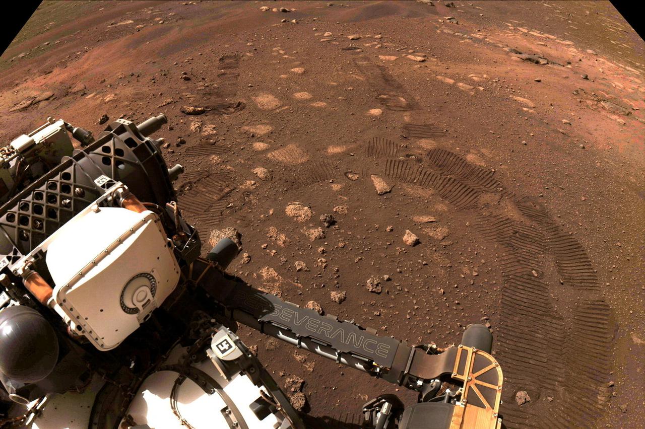 FILE PHOTO: NASA's Mars rover Perseverance takes its first, short drive on the surface of the red planet