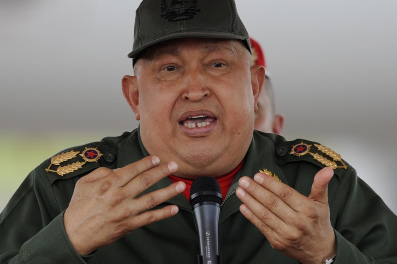 'Venezuelan President Hugo Chavez delivers a speech upon landing at the airport in Tachira, Venezuela, on October 20, 2011. Chavez said Thursday his cancer treatment has been successful and that he wa