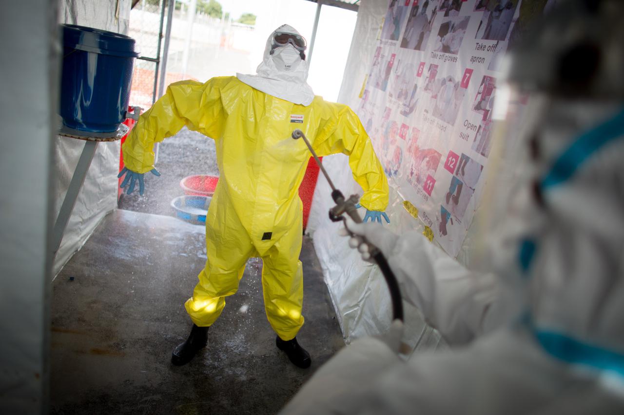 Volunteer Ebola helpers in protective suits prepare for a demonstration of their work at the SITTU (Severe Infections Temporary Treatment Unit) in Monrovia, Liberia, 09 April 2015. German Federal Ministers Groehe and Mueller are traveling to Liberia and v