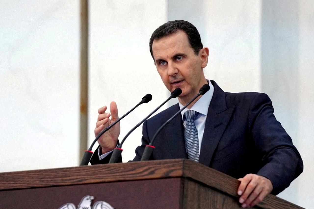 FILE PHOTO: Syria's President Bashar al-Assad addresses the new members of parliament in Damascus