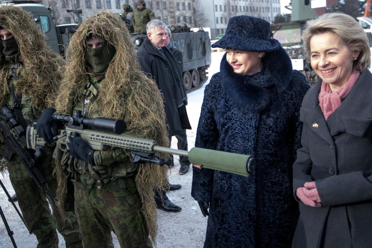 The German minister of defence Ursula von der Leyen (CDU, r) and the president of Lithuania Dalia Grybauskaite stand next to Lithuanian army snipers in Rukla, Lithuania, 07 February 2017. The German army is leading Nato exercises in the Baltic country as 