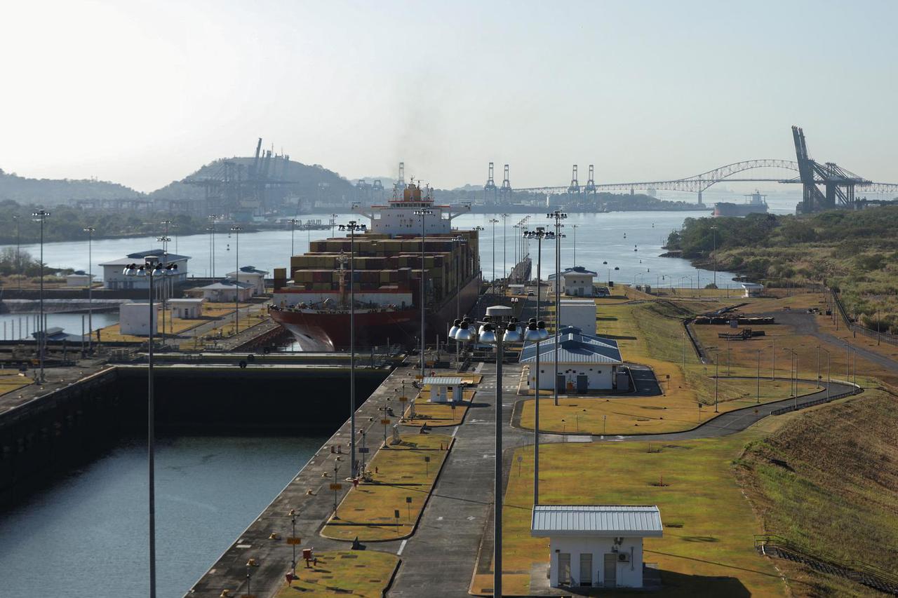 Cargo vessels transit through the Panama Canal, on the outskirts of Panama City