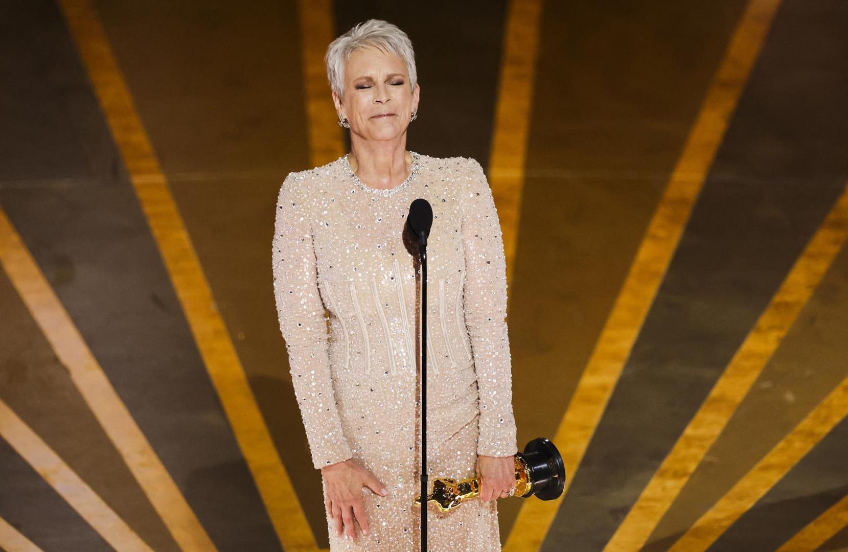 Jamie Lee Curtis wins the Oscar for Best Supporting Actress for "Everything Everywhere All at Once" during the Oscars show at the 95th Academy Awards in Hollywood, Los Angeles, California, U.S., March 12, 2023. REUTERS/Carlos Barria Photo: CARLOS BARRIA/REUTERS