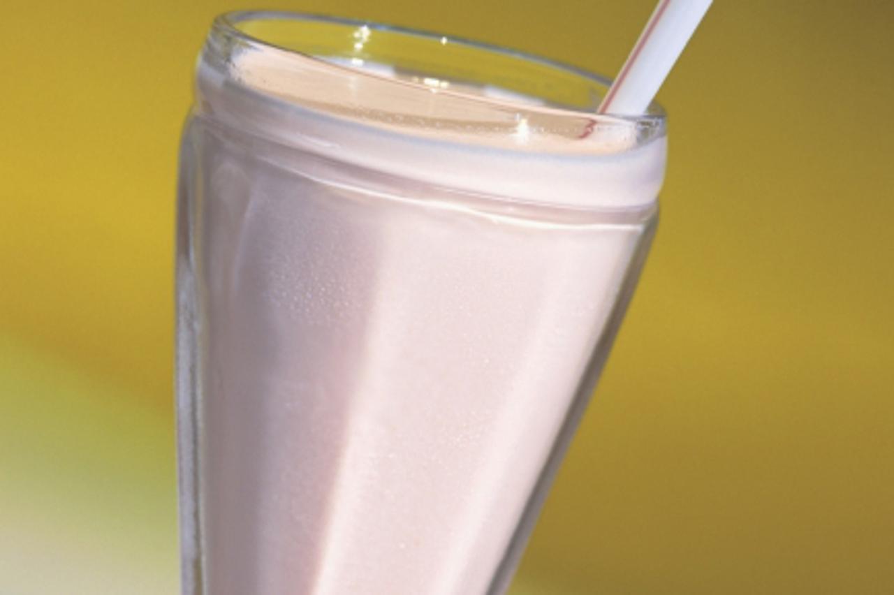 'close-up of a strawberry milkshake'