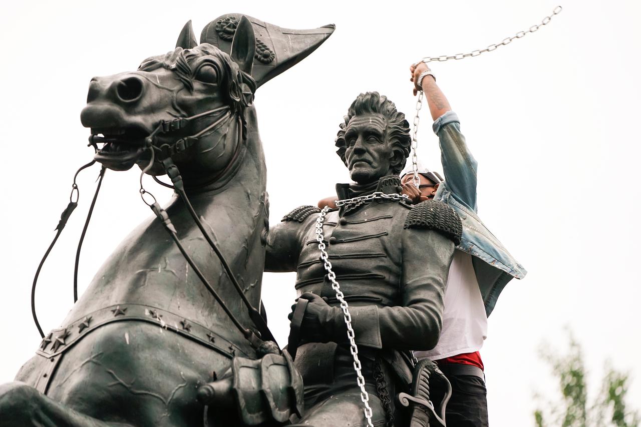 Protestors try to pull down statue of U.S. President Andrew Jackson in front of the White House in Washington