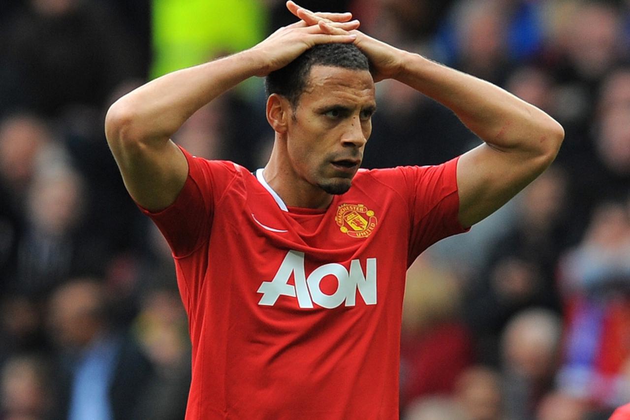 'Manchester United\'s English defender Rio Ferdinand reacts during the English Premier League football match between Manchester United and Everton at Old Trafford in Manchester, north-west England on 